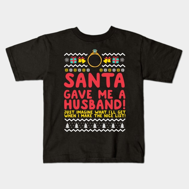 Santa Gave Me A Husband For Christmas Kids T-Shirt by thingsandthings